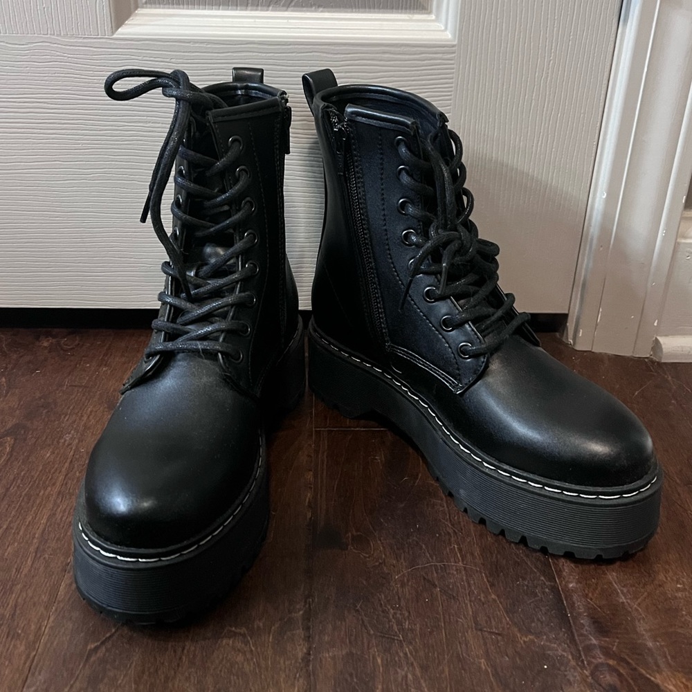 Black Combat boots. Size: 7